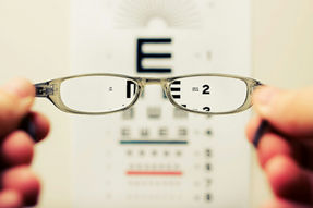 A blurry vision test with glasses showing area in focus