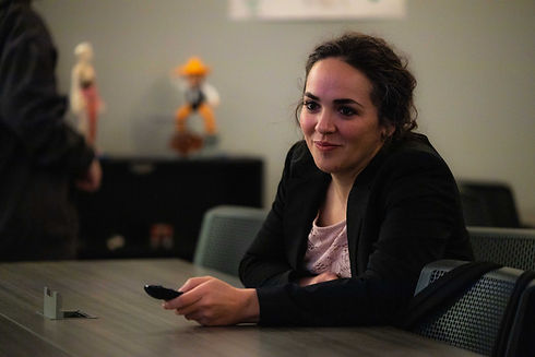 Female teacher smiling.